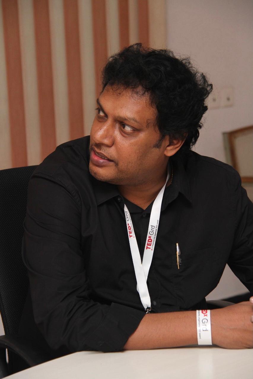 DR KKR Image in black Shirt